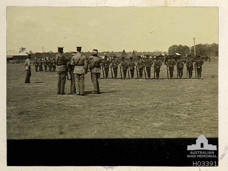 Image of Liverpool, NSW. c. 1914. Recruits at the Army camp being instructed in fixing bayonets.
