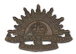 Image of Oxidised 'rising sun' hat badge with two lugs soldered to the reverse - rel30388